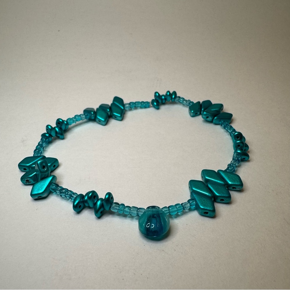 Hand Crafted Glass and Metal Beaded Stretch Bracelet with Ombré Seashell.